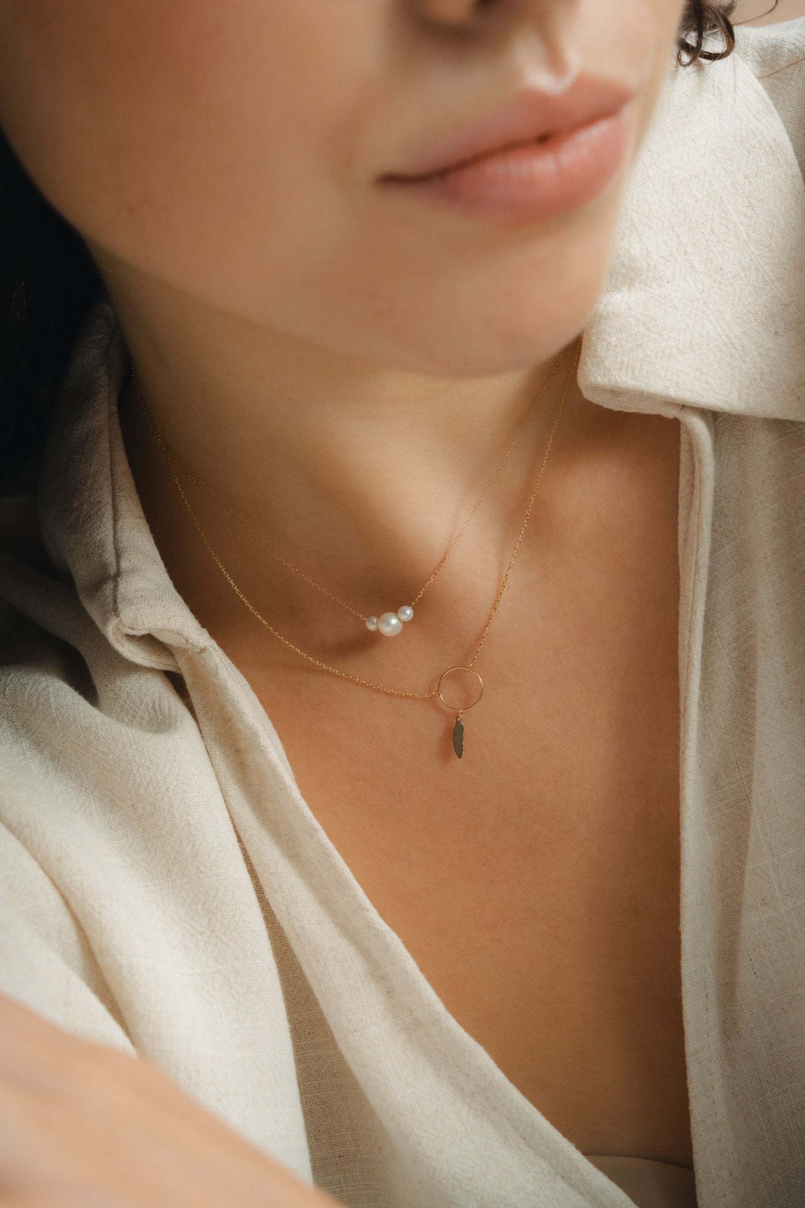 Collar de oro Pluma