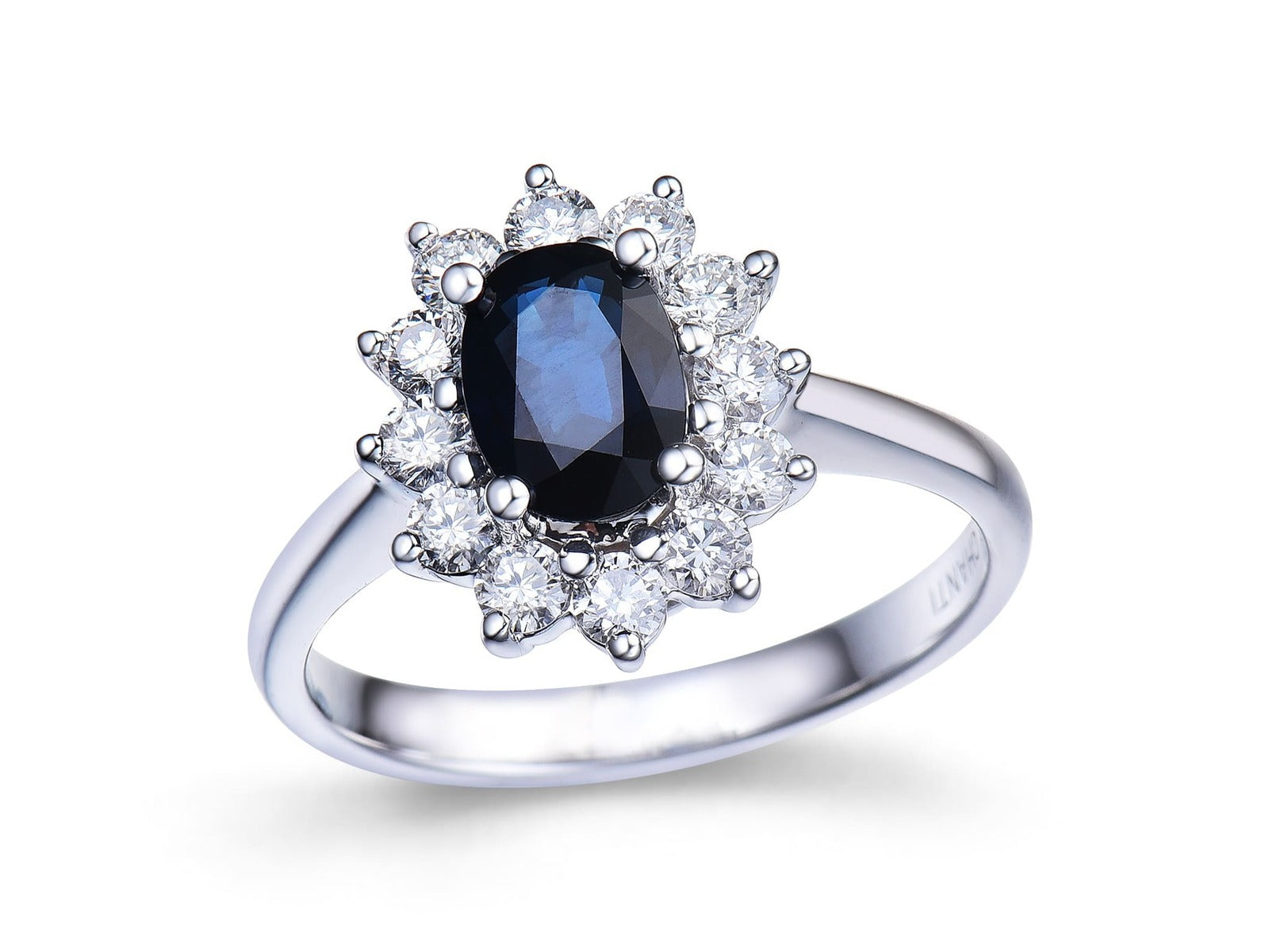 Anillo de Oro blanco con Diamantes y Zafiro Oshun